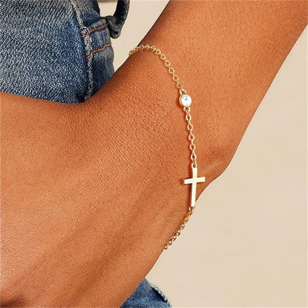 Pulsera Delicada Cruz y Punto de Luz